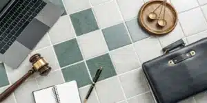 Lawyer workspace with a gavel and scales of justice for a guide to the main types of lawyers.